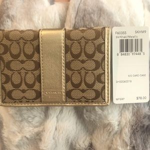Lightly used Coach signature card case